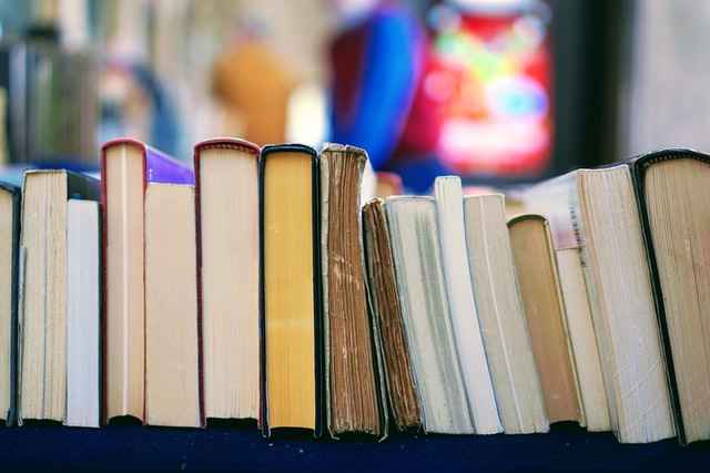 Photo of books by Tom Hermans on Unsplash